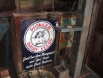 Pioneer cow metal sign