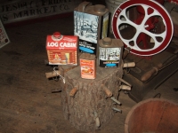 Collection of Maple Syrup tins and tree tappers