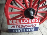 Enamel Kellogg's fertilizer sign